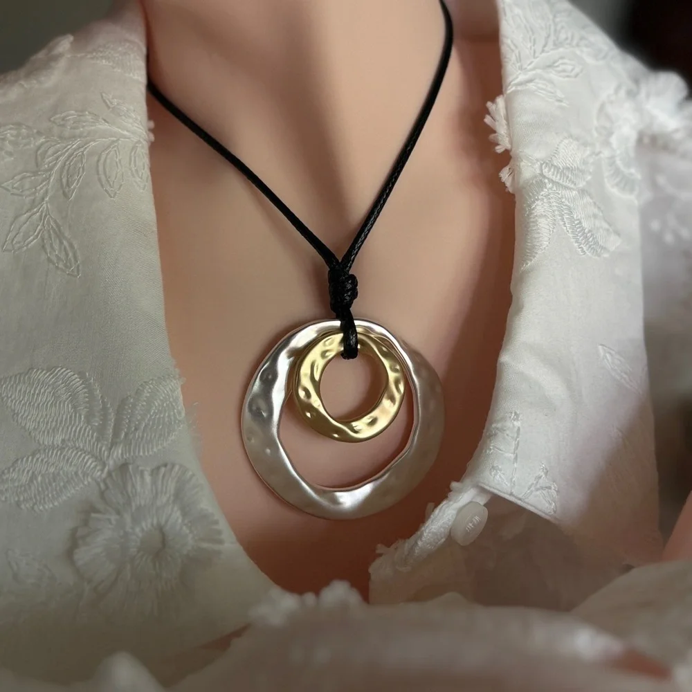 Black Cord Necklace with Silver and Gold Pendant